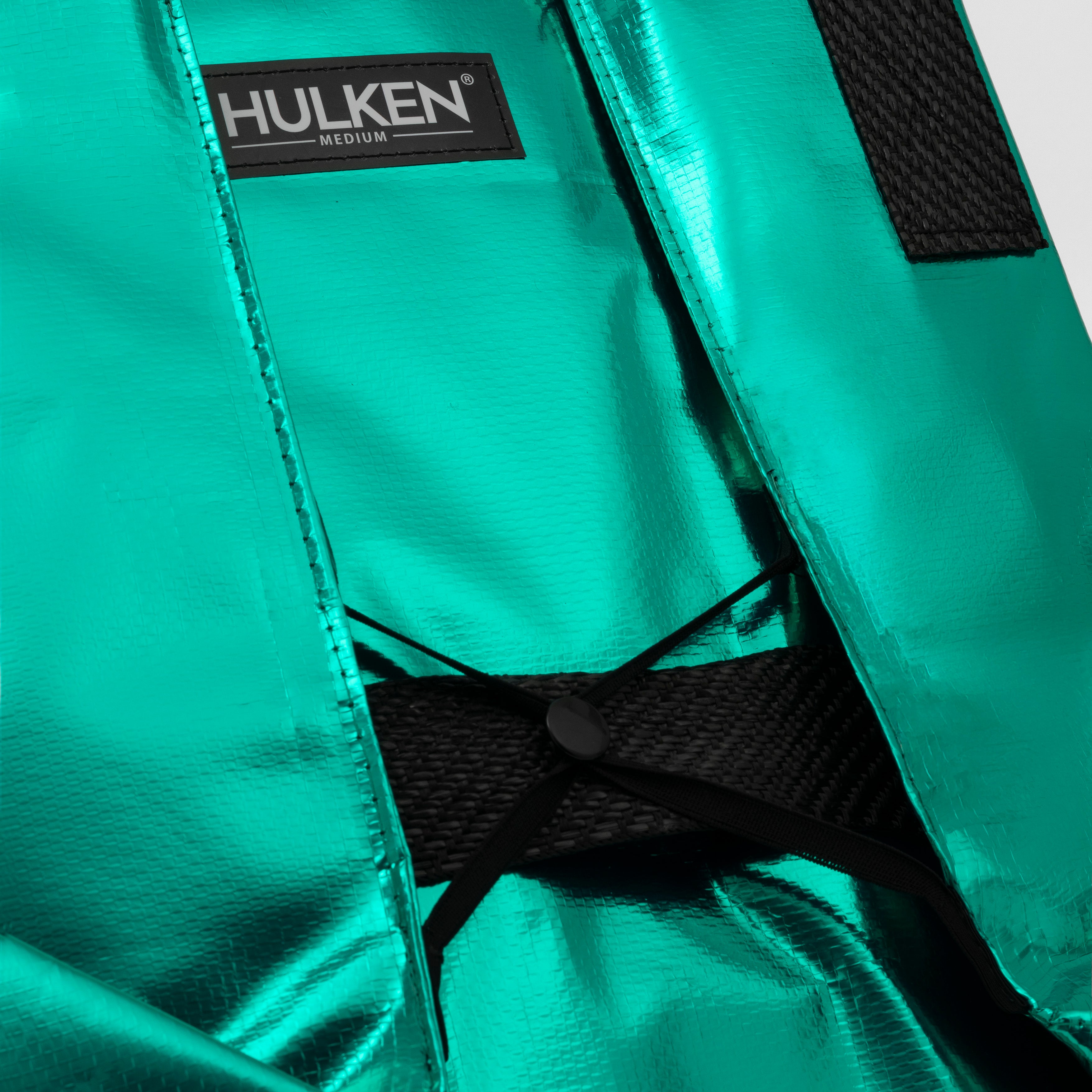 Hulken logo on a teal bag