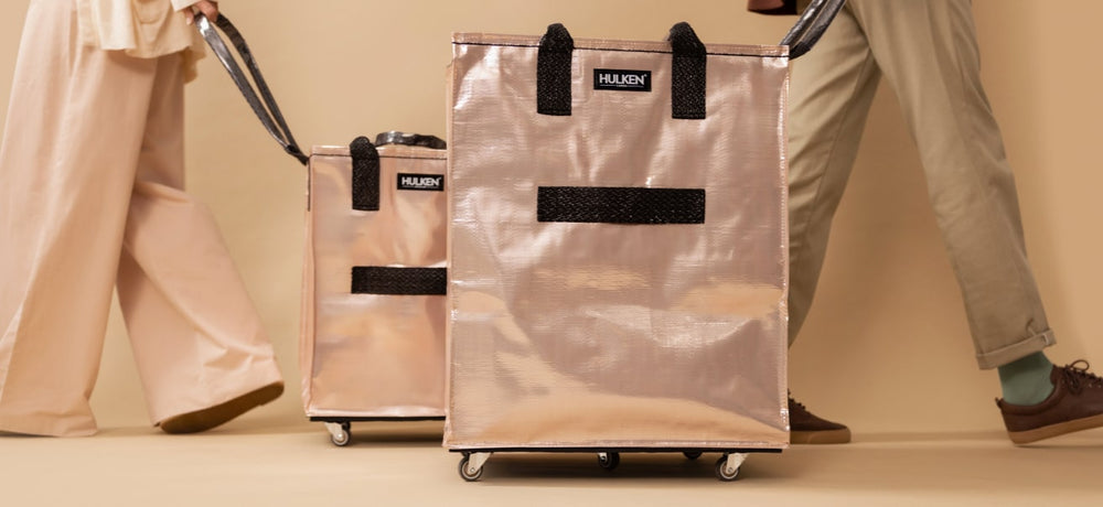 People carrying rose gold tote bags
