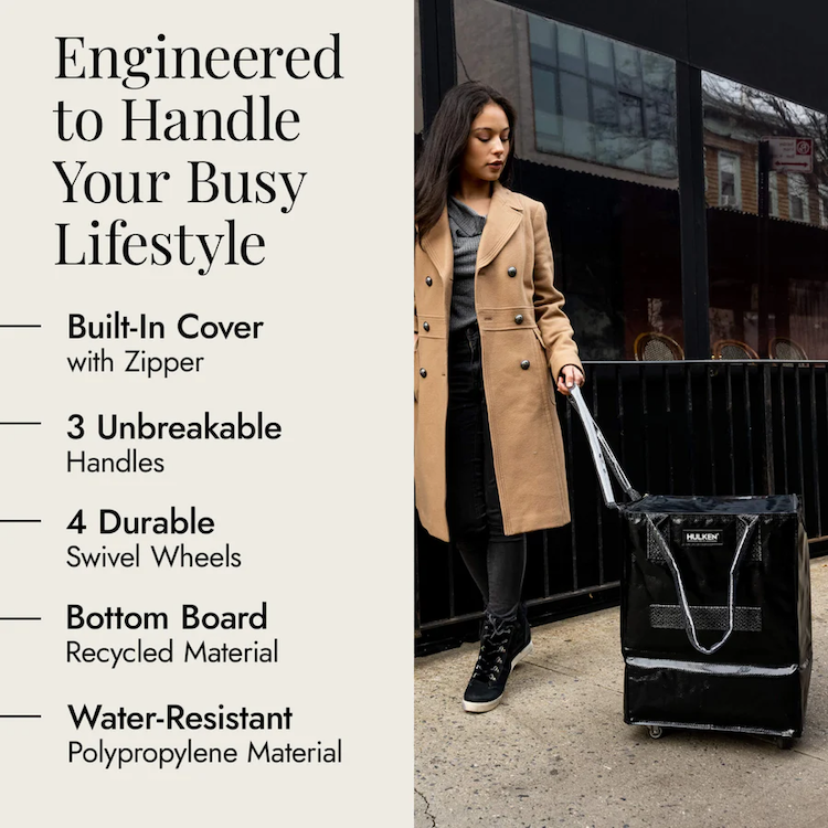 Busy lifestyle: stylish black tote bag carried by a person