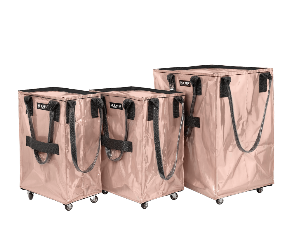 Comparison of three sizes of rose gold pink tote bags